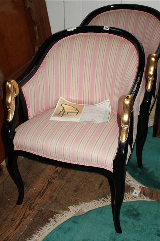 Pair of tub chairs with gilt arms